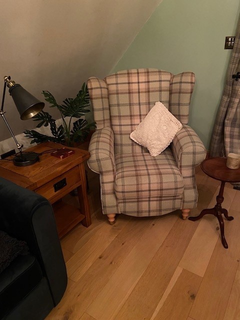 A comfortable chair in the treatment space